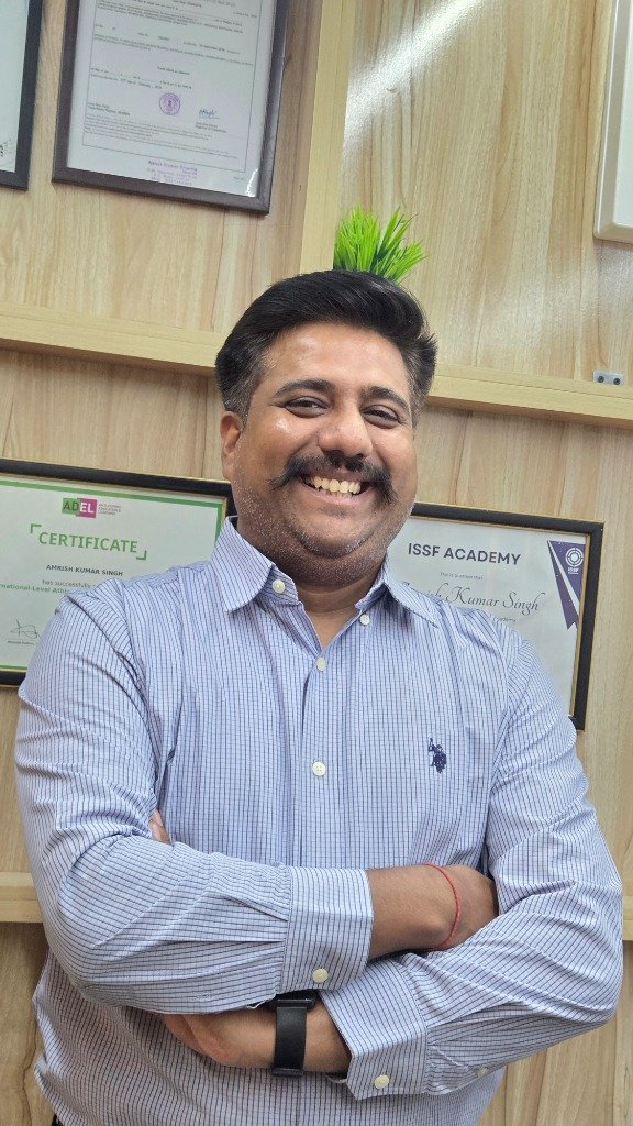 Head Coach Amrish Singh profile headshot